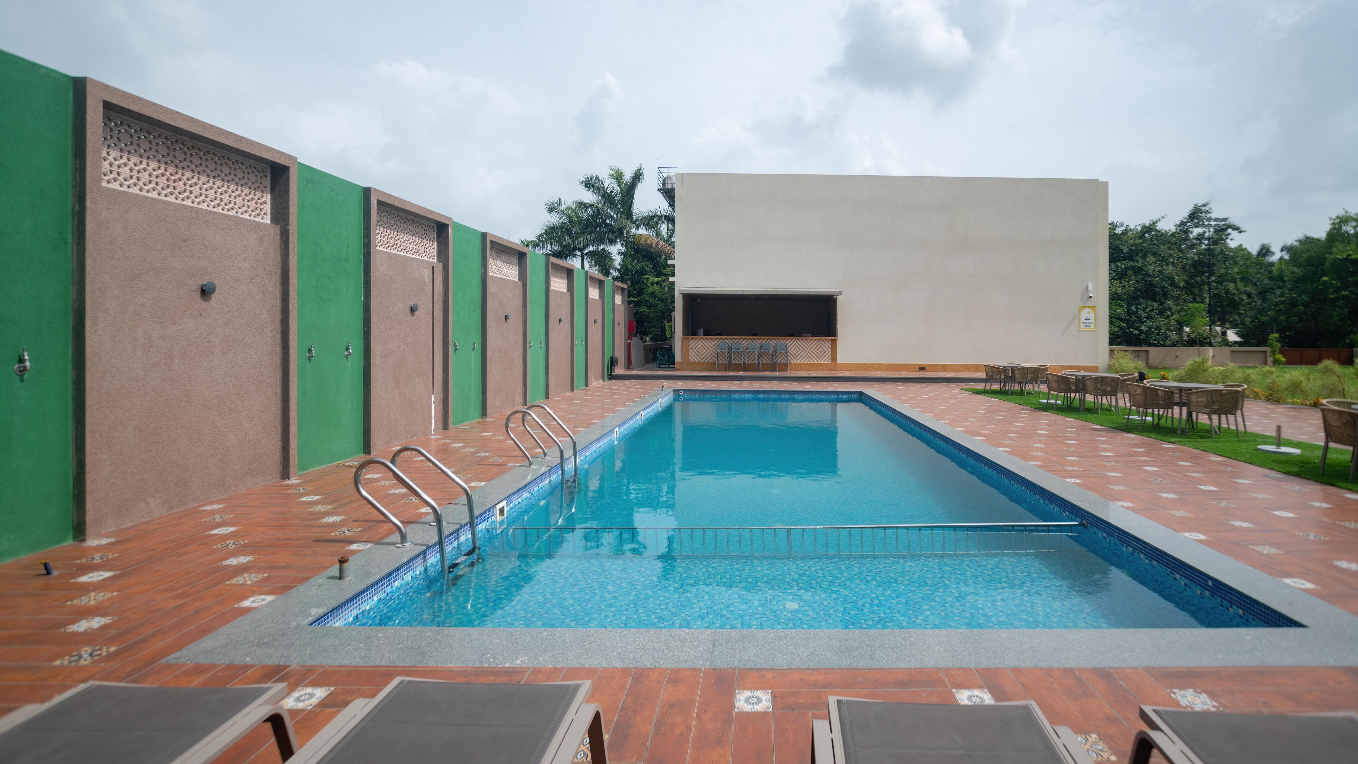 Haldi Kumkum Resort, Kamrej - Tap to explore photos