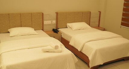 Neom Inn Room Type - Deluxe Twin Bed Ac