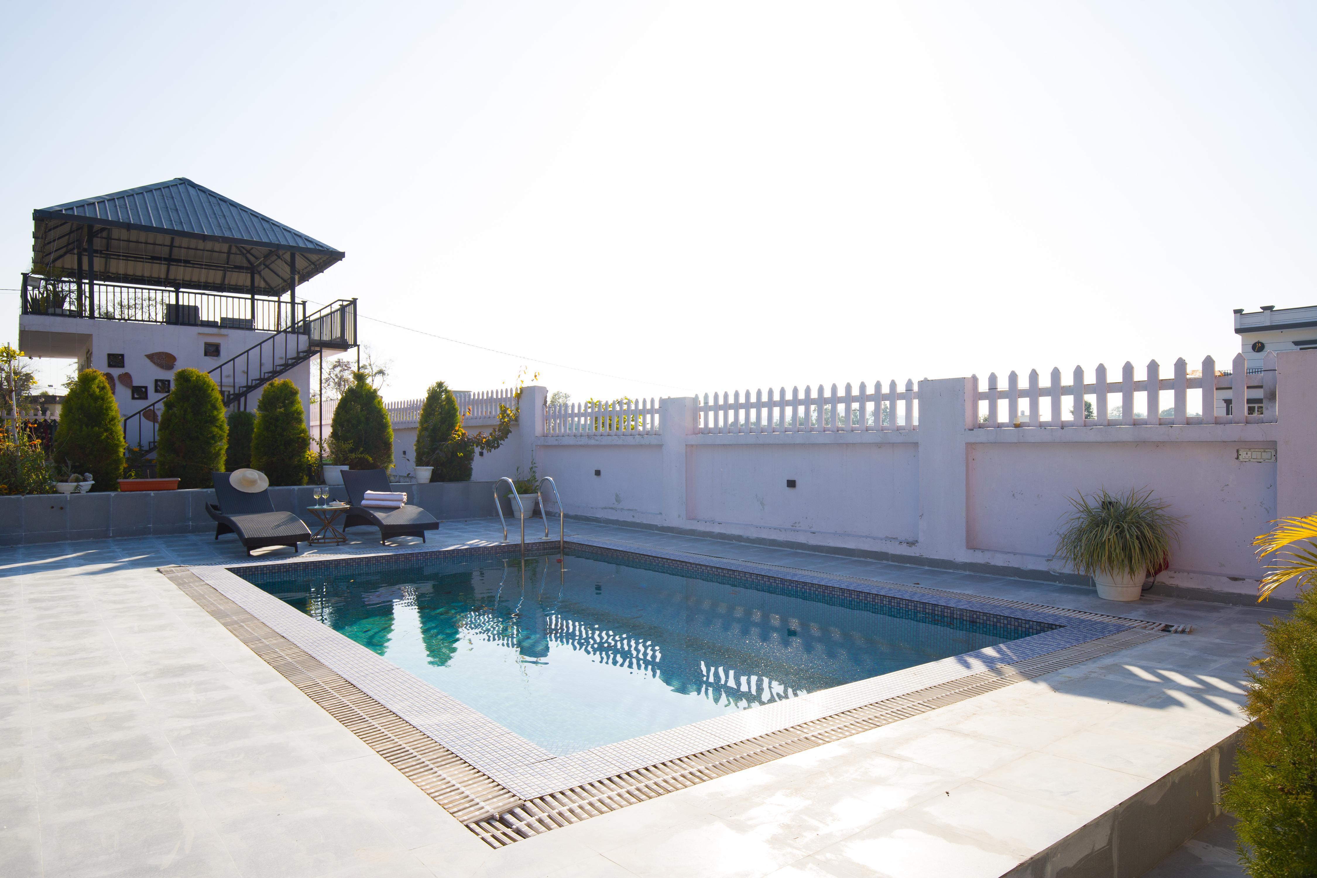 Breezy Hill Retreat 3 BHK Cottage with Pool & Garden - Tap to explore photos