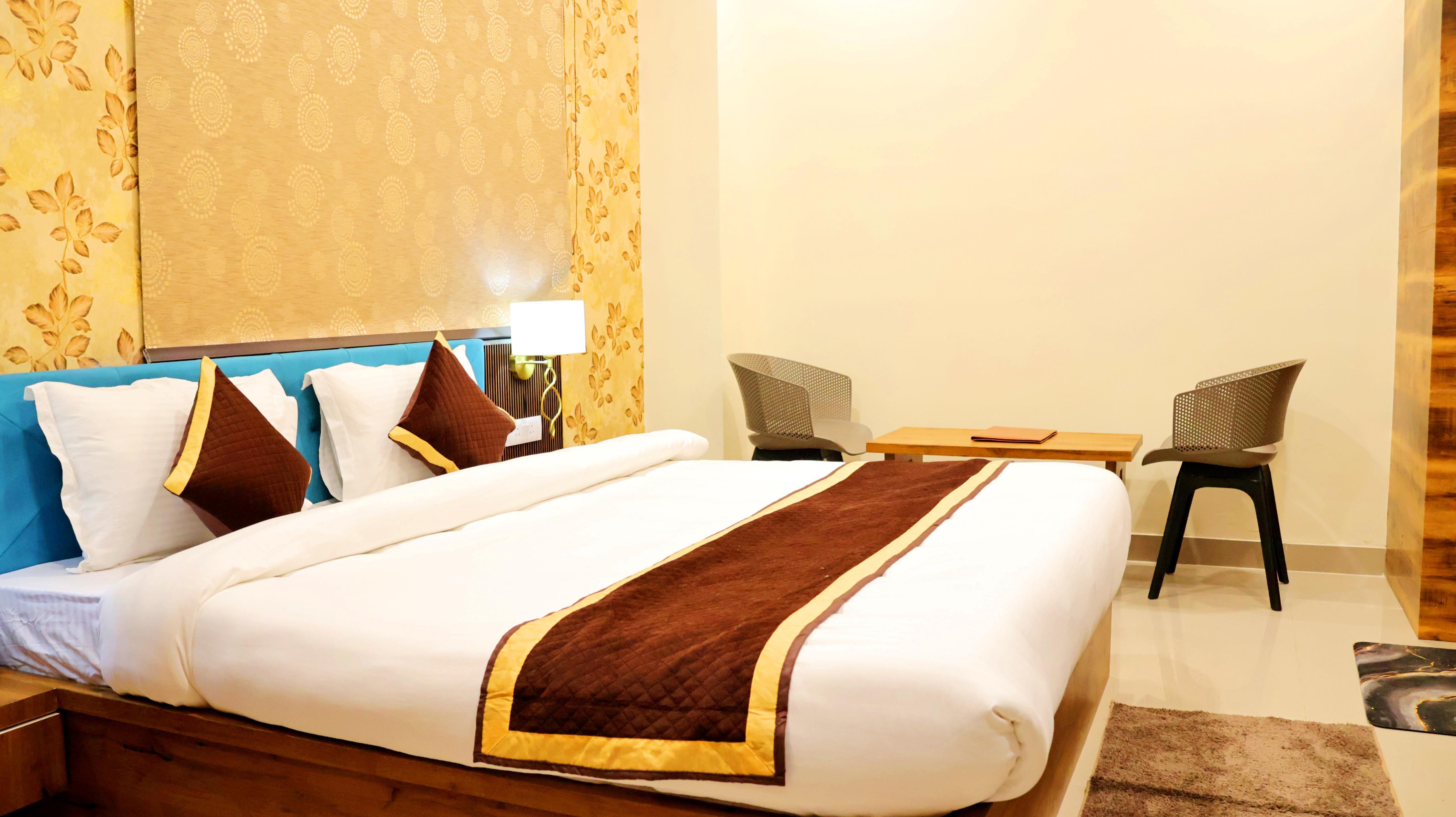 Hotel Tulsi Grand Inn - Tap to explore photos