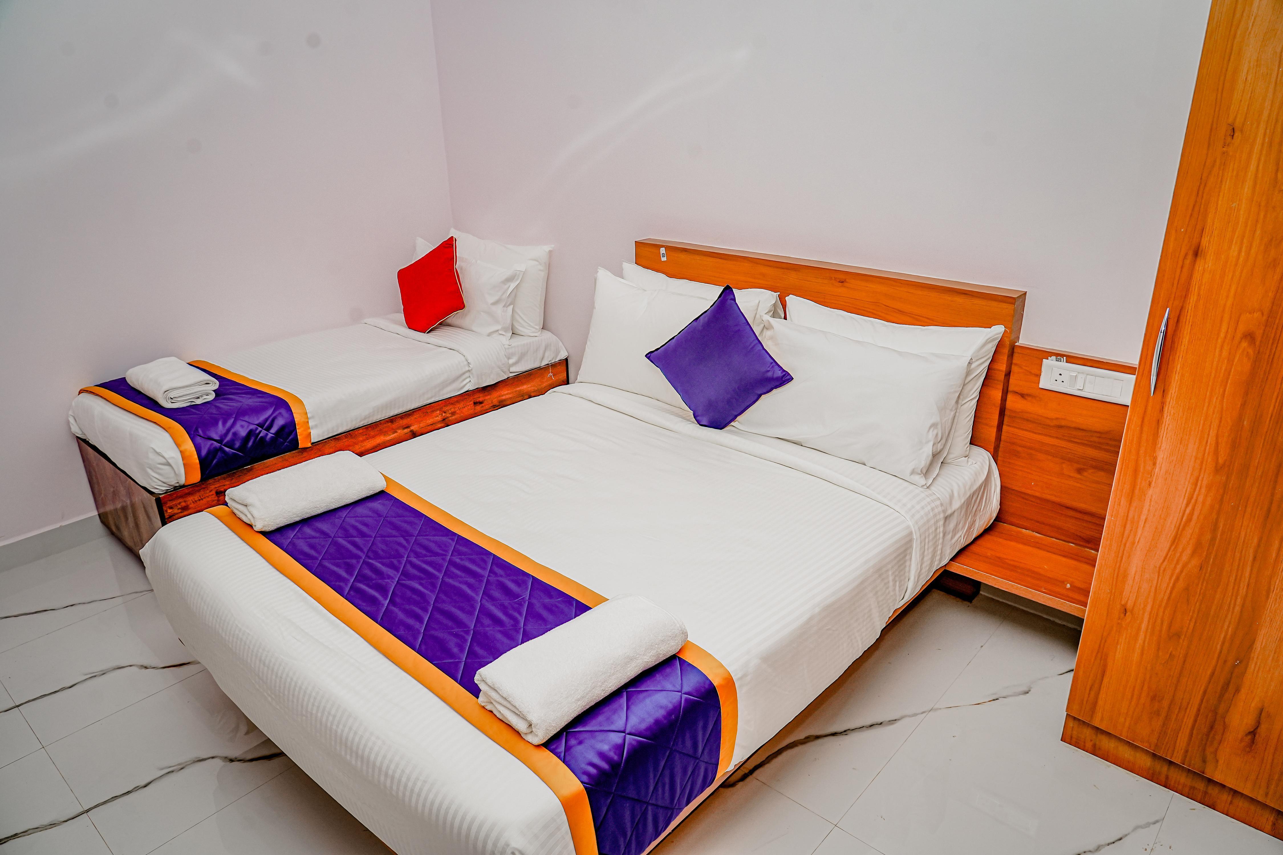 Keerthis Grand - Near Kempegowda int'l Airport Hotel Room Type - Deluxe Triple Bed Ac Room Keerthis Grand - Near Kempegowda int'l Airport Hotel Room Type - Deluxe Triple Bed Ac Room