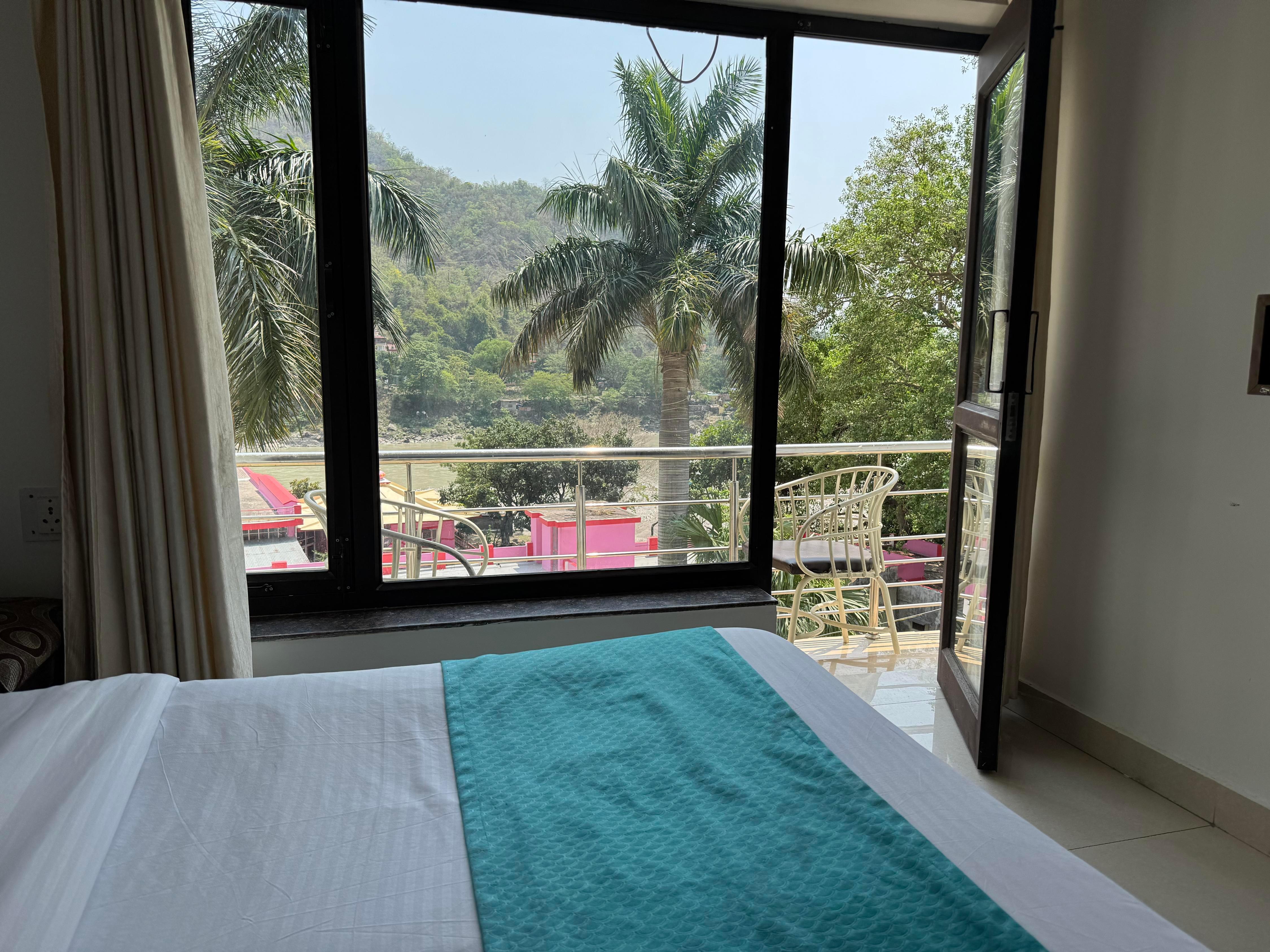 Nirvana Riverside Resort with Ganga View Rooms - Tap to explore photos