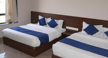 Hotel Sisodiya Palace (Free Gated Parking & 10 Minutes walk from Temple) Room Type - Family Room ( 2 Double Bed | 4 Pax )