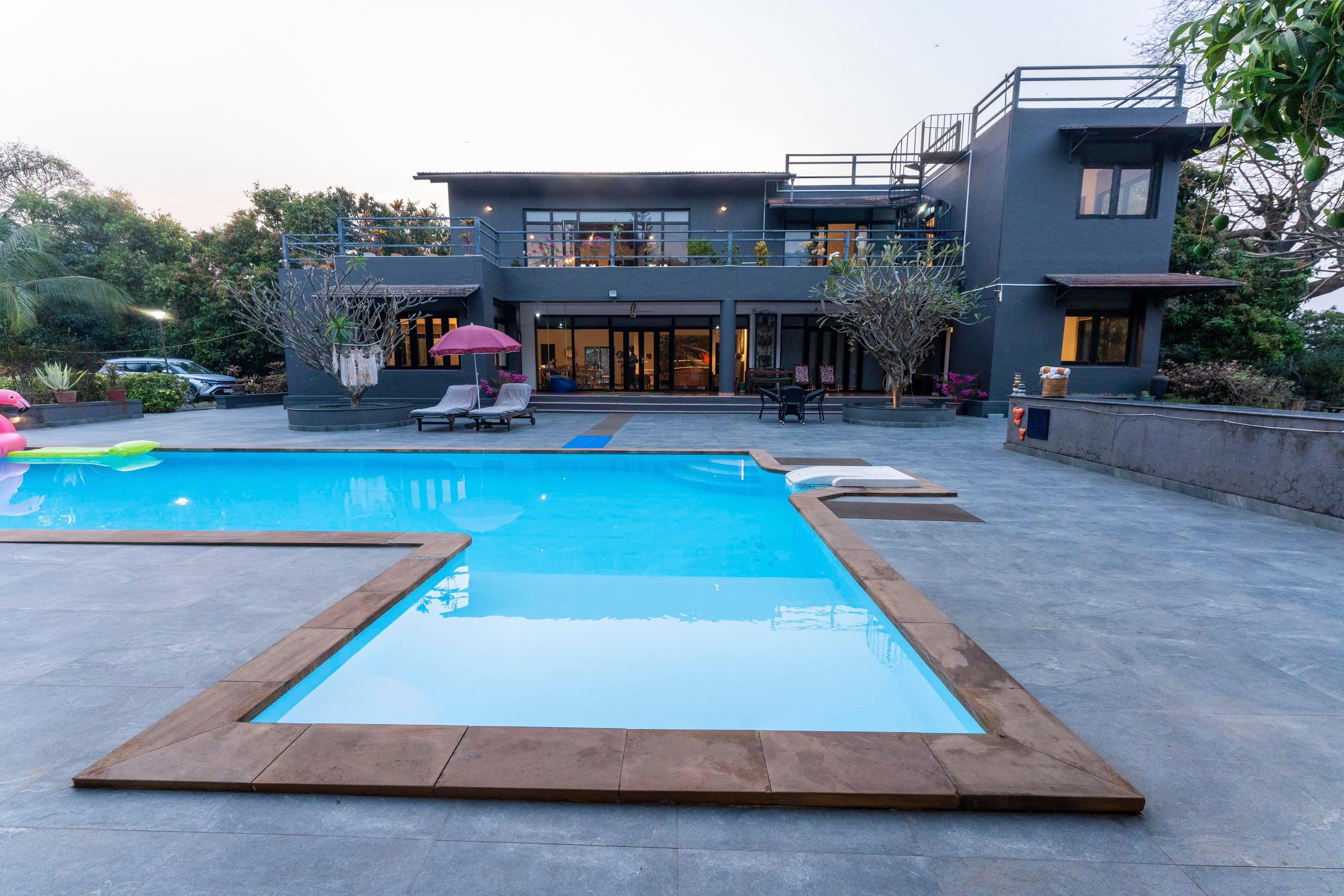 ELIVAAS Signature El Parque Forest Villa | 5 BHK with Private Pool, Lush Greenery & Gaming Zone - Tap to explore photos