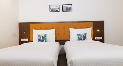 TreeHouse Vedanta Pride Hubballi Room Type - Deluxe Twin-Bed Room