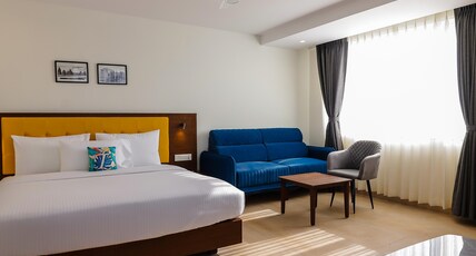 TreeHouse Vedanta Pride Hubballi Room Type - Deluxe Family Room