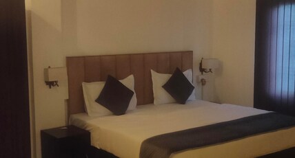 Rudraksh Paradise. Room Type - Delux Room with Balcony