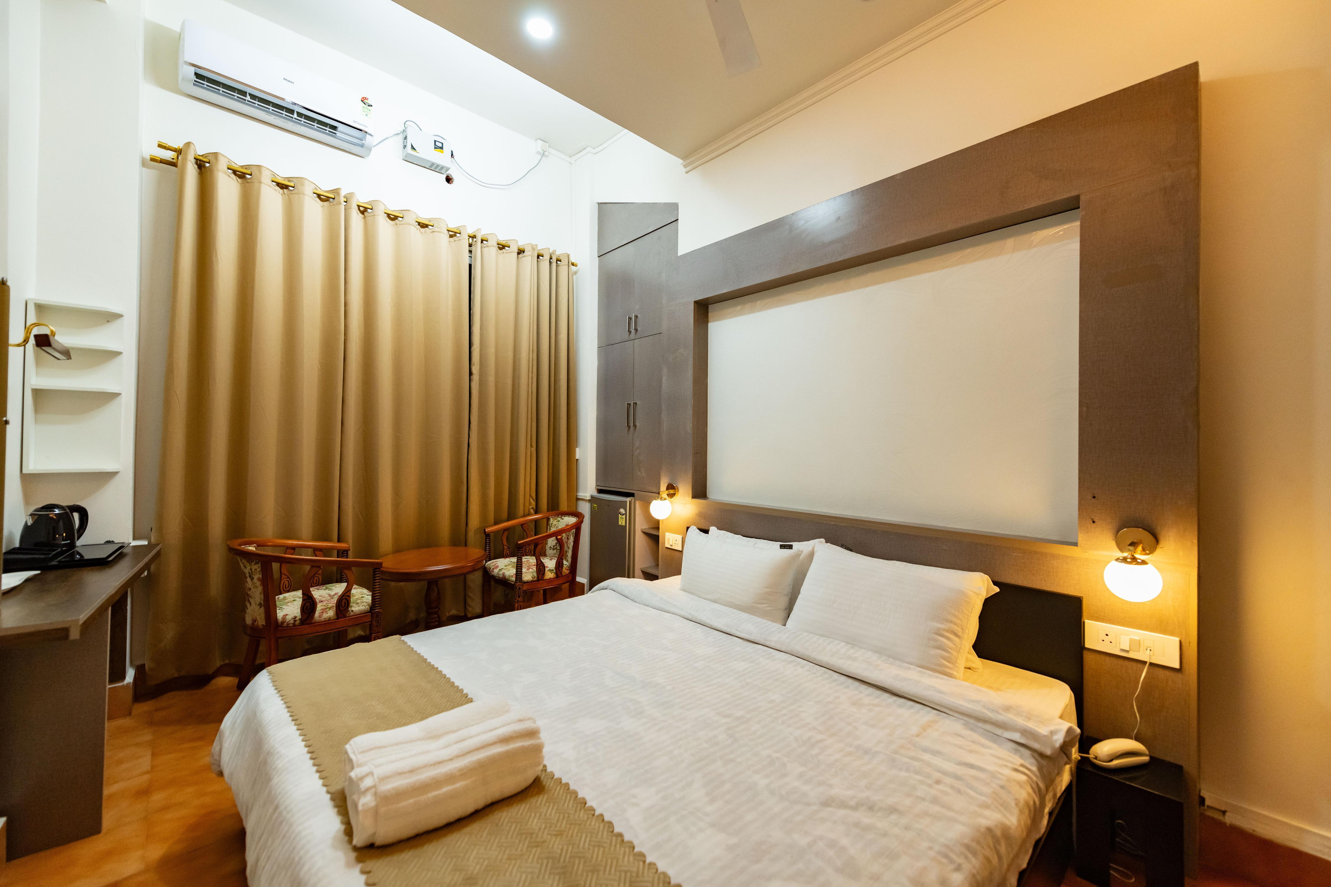 Rest Inn Hotel - Tap to explore photos