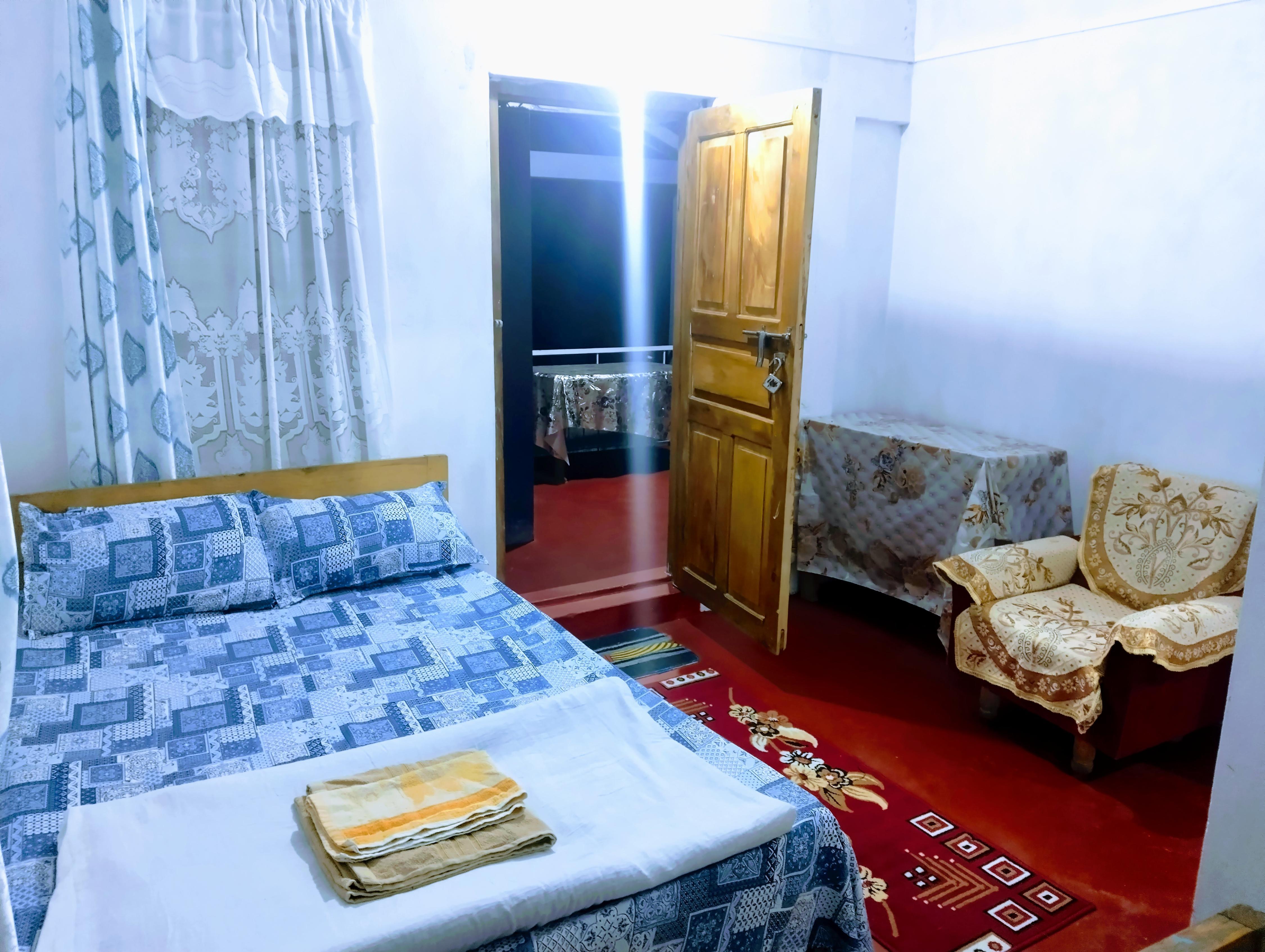 Kyntiew Homestay | Rooms with a Kitchen - Tap to explore photos