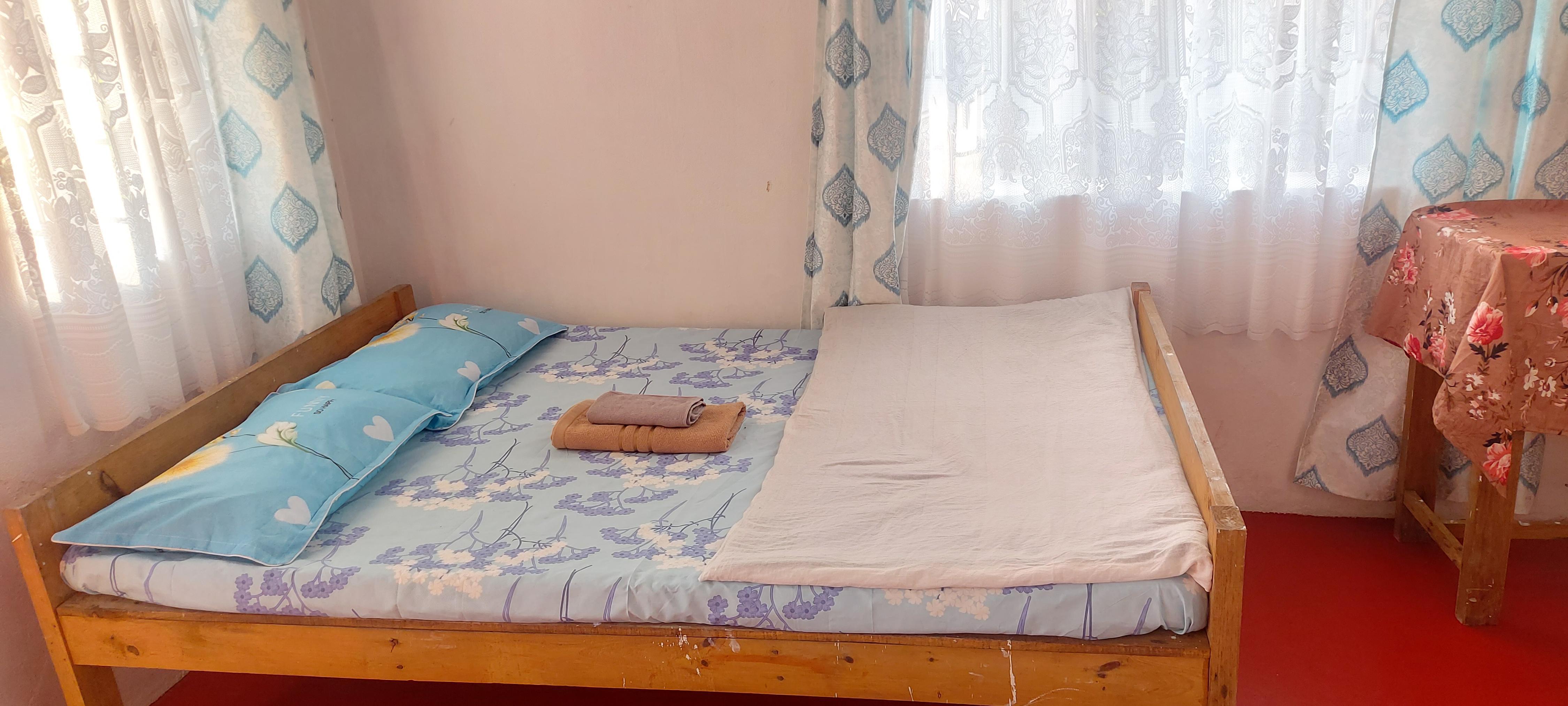 Kyntiew Homestay | Rooms with a Kitchen - Tap to explore photos