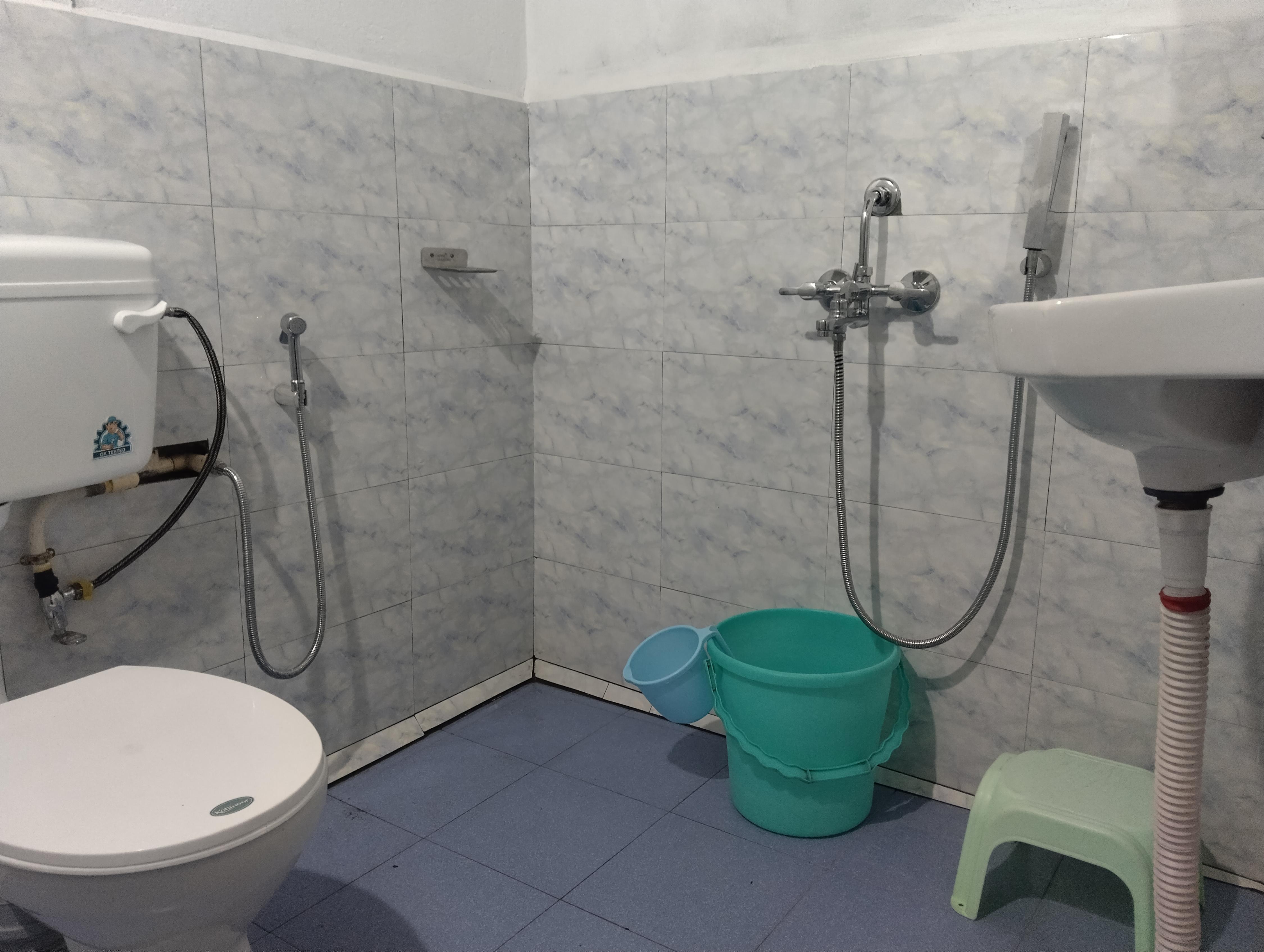 Kyntiew Homestay | Rooms with a Kitchen - Tap to explore photos