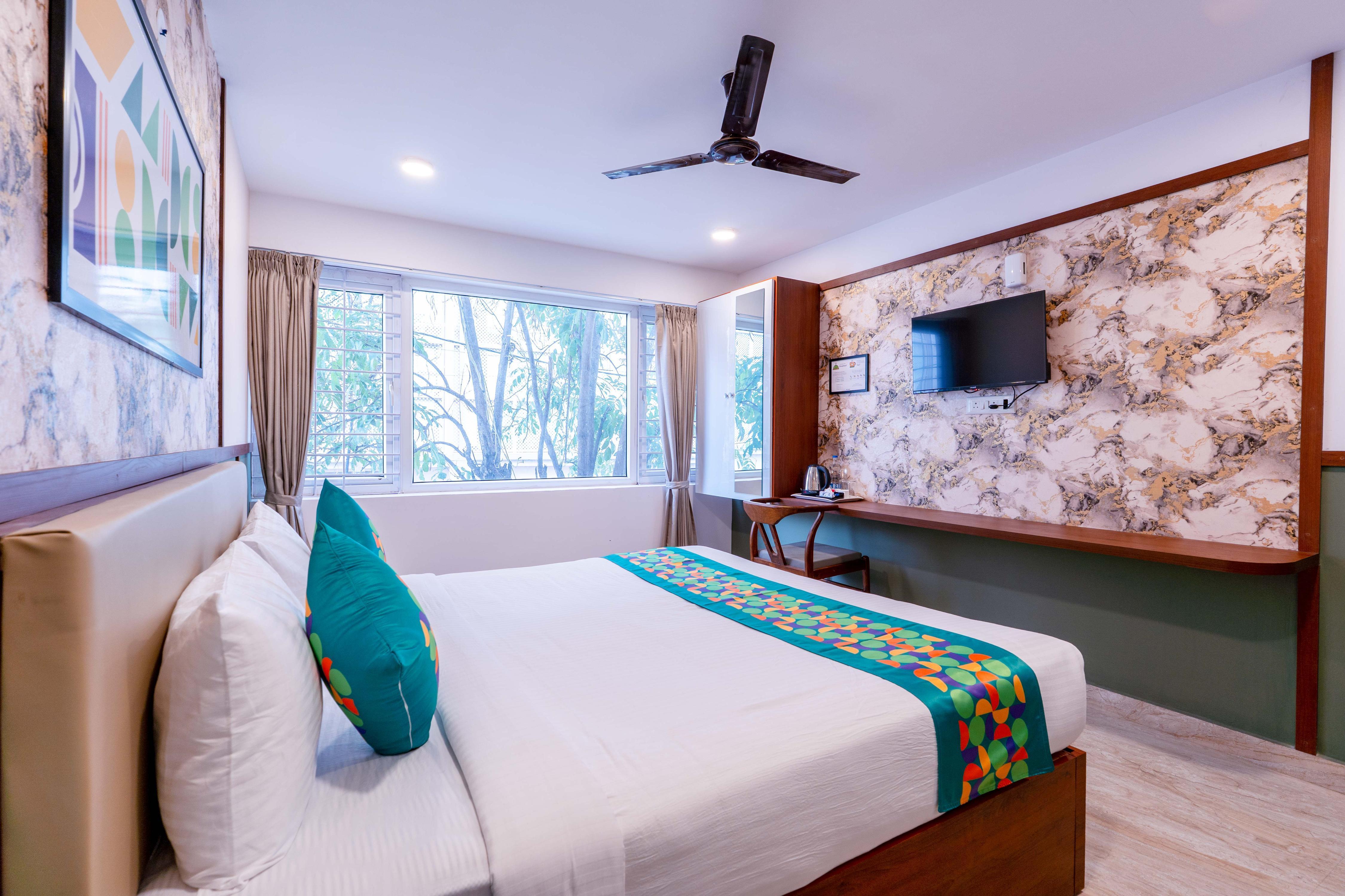 Treebo Emirates Suites Indiranagar - Tap to explore photos