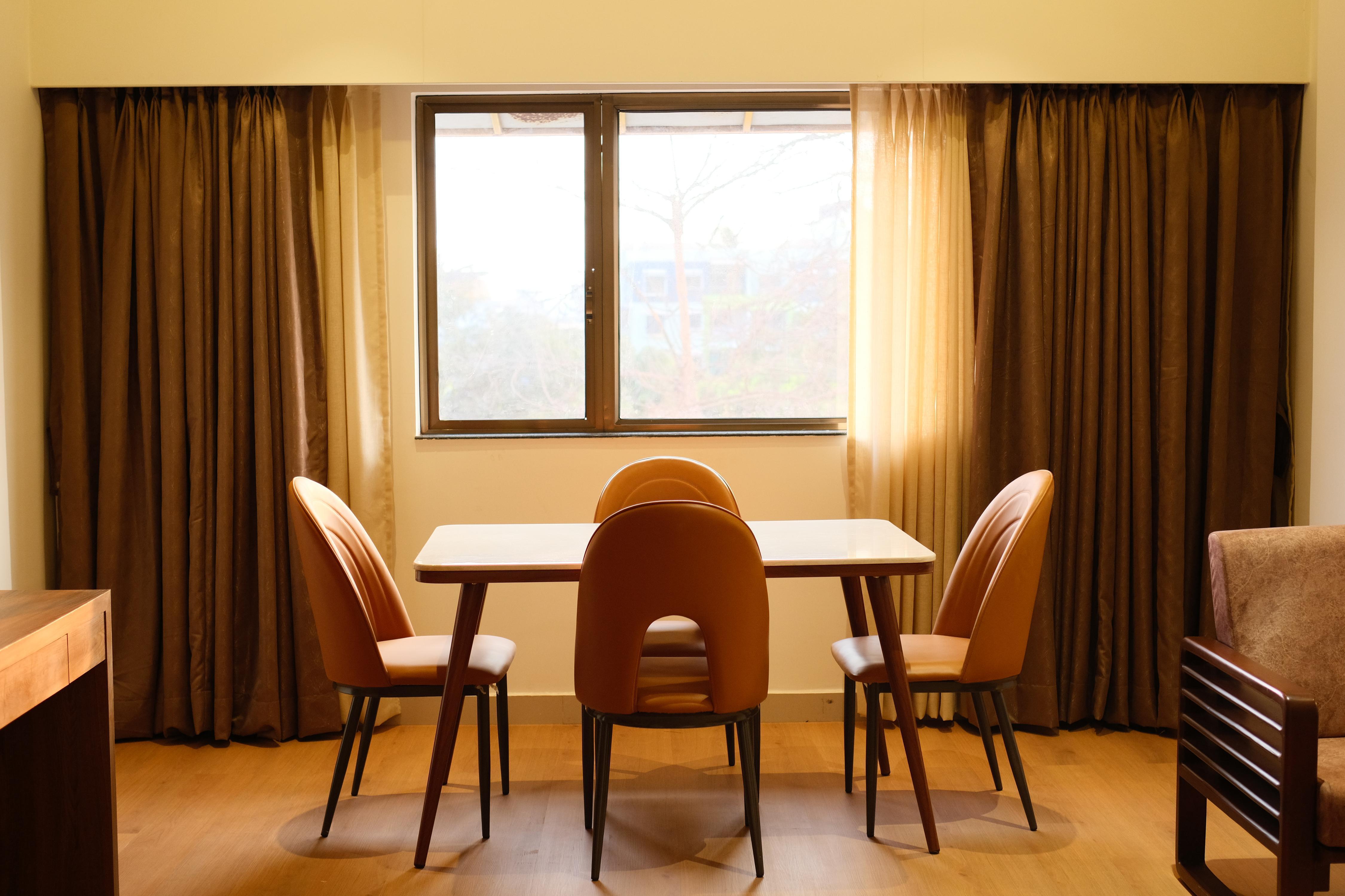 Sunstone Suites by Jagrut Retreats - Tap to explore photos