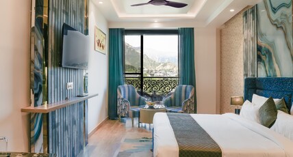 Alivaa Hotel, McLeodganj  Best Dhauladhar View | Infinity Pool & Sky Garden Room Type - Premium King Room with Balcony