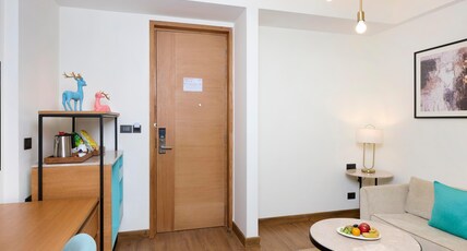 Iris Sarovar Portico Room Type - Junior Suite Pool View with Balcony