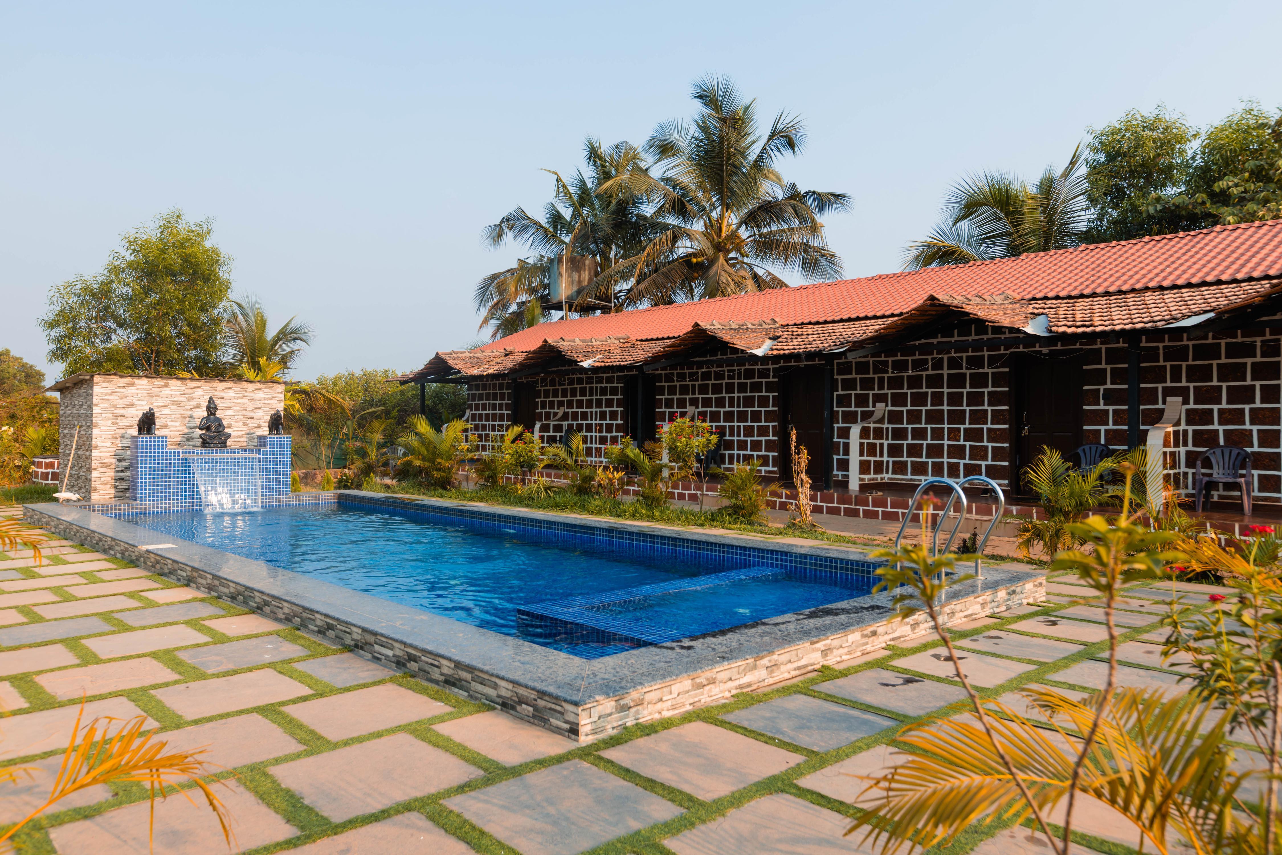 Peacock 4BR Cottages with Private Pool Saligao - Tap to explore photos