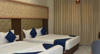 Hotel Aaradhya Inn Room Type - 4 Bedded AC Family Room (Price is for 4 Adults)