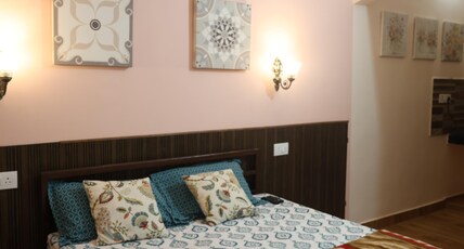 Shiv Homestay Room Type - Peach Cinema Suite – Private Theatre Experience