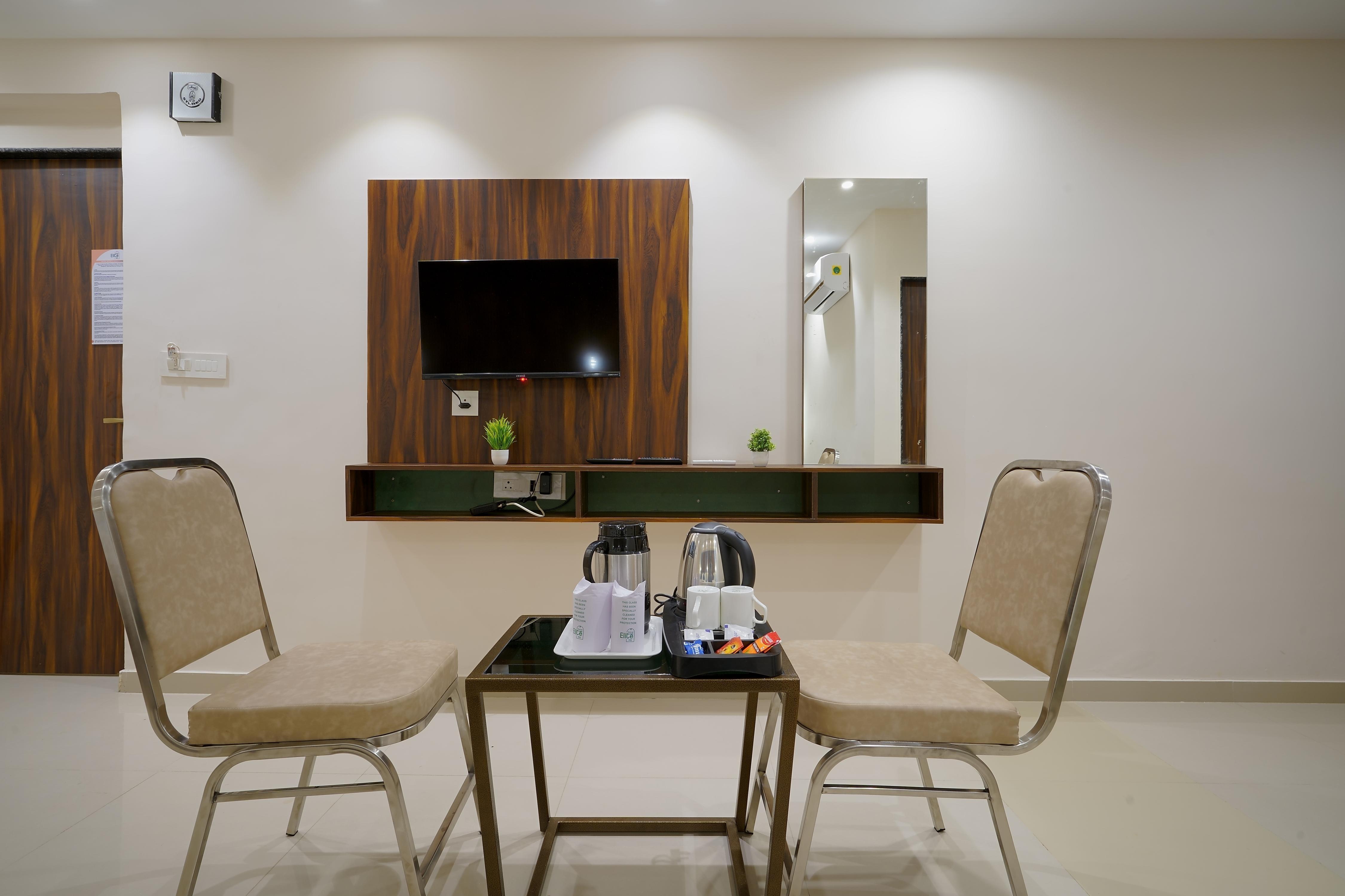 hotel Elite Inn - Mirzapur, Ahmedabad - Tap to explore photos