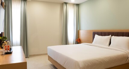 Hotel Orchids Suites kokapet Room Type - Deluxe Room
