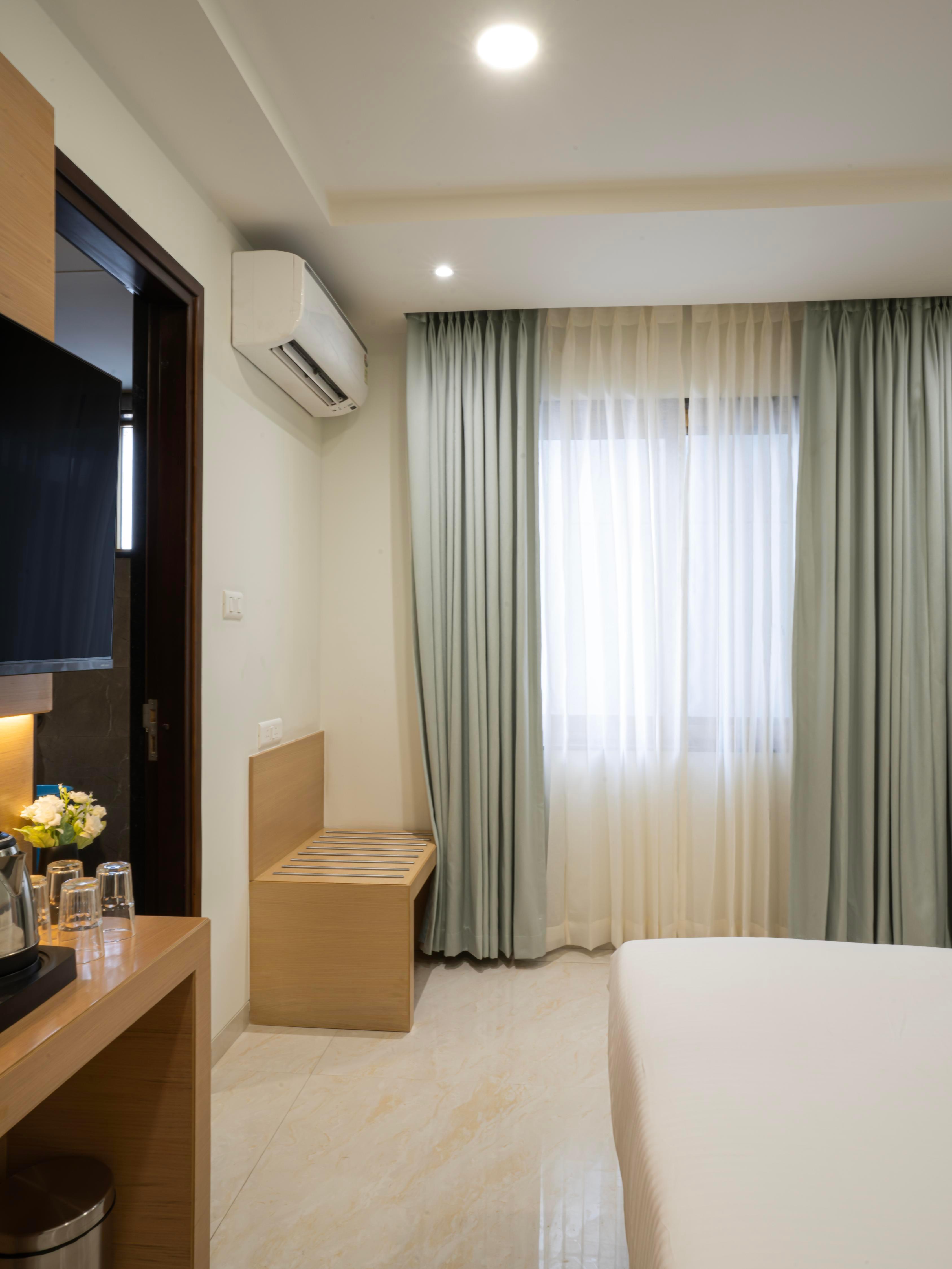 Hotel Orchids Suites kokapet - Tap to explore photos
