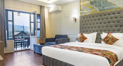 Classy Castle Pahalgam Room Type - Deluxe Mountain View With Balcony(Hot and Cold AC) Classy Castle Pahalgam Room Type - Deluxe Mountain View With Balcony(Hot and Cold AC)