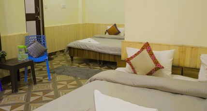 Parvati hill view homestay Room Type - Deluxe quadruple room