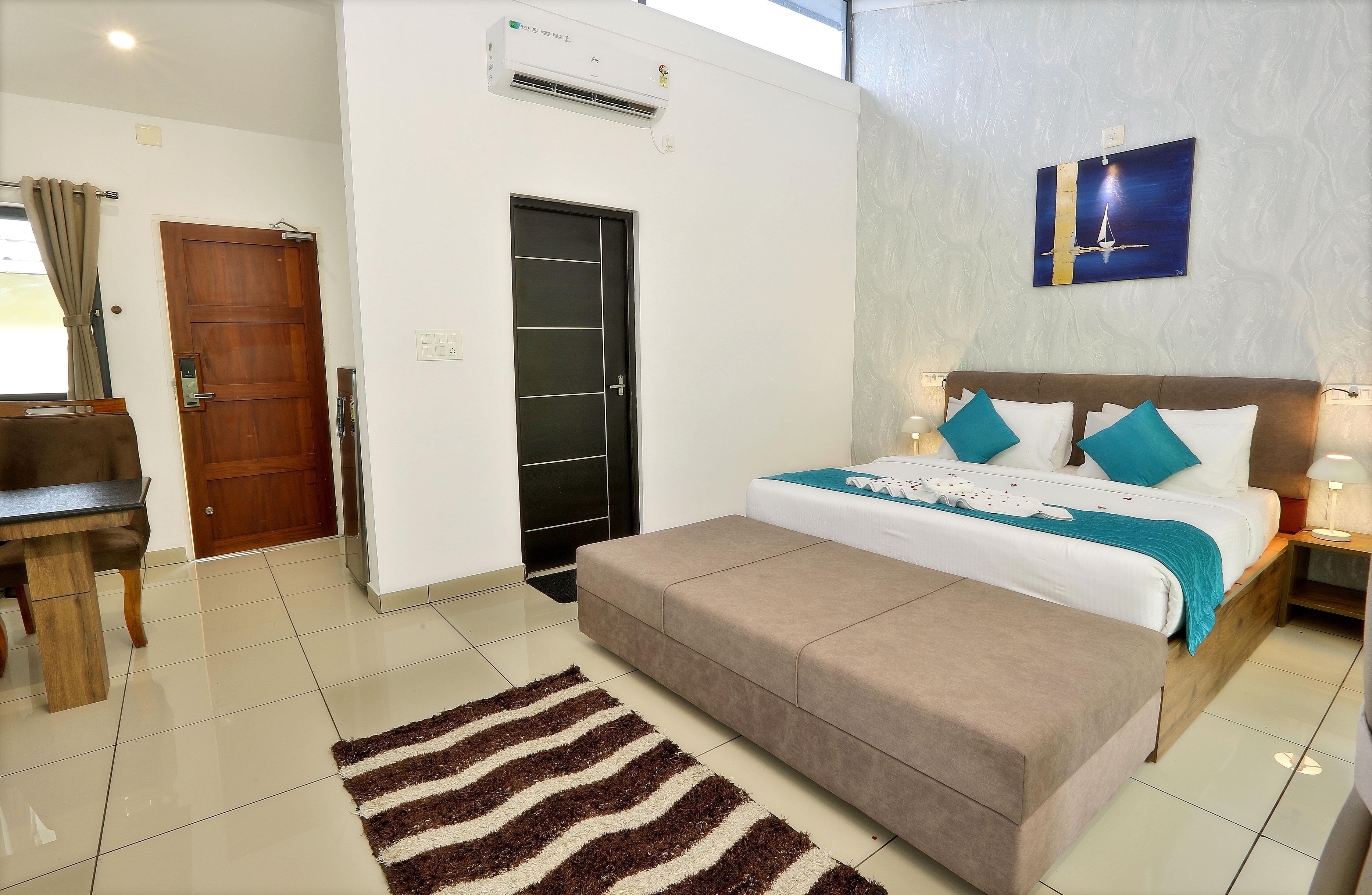 B Town Resort Near Infopark Kakkanad - Tap to explore photos