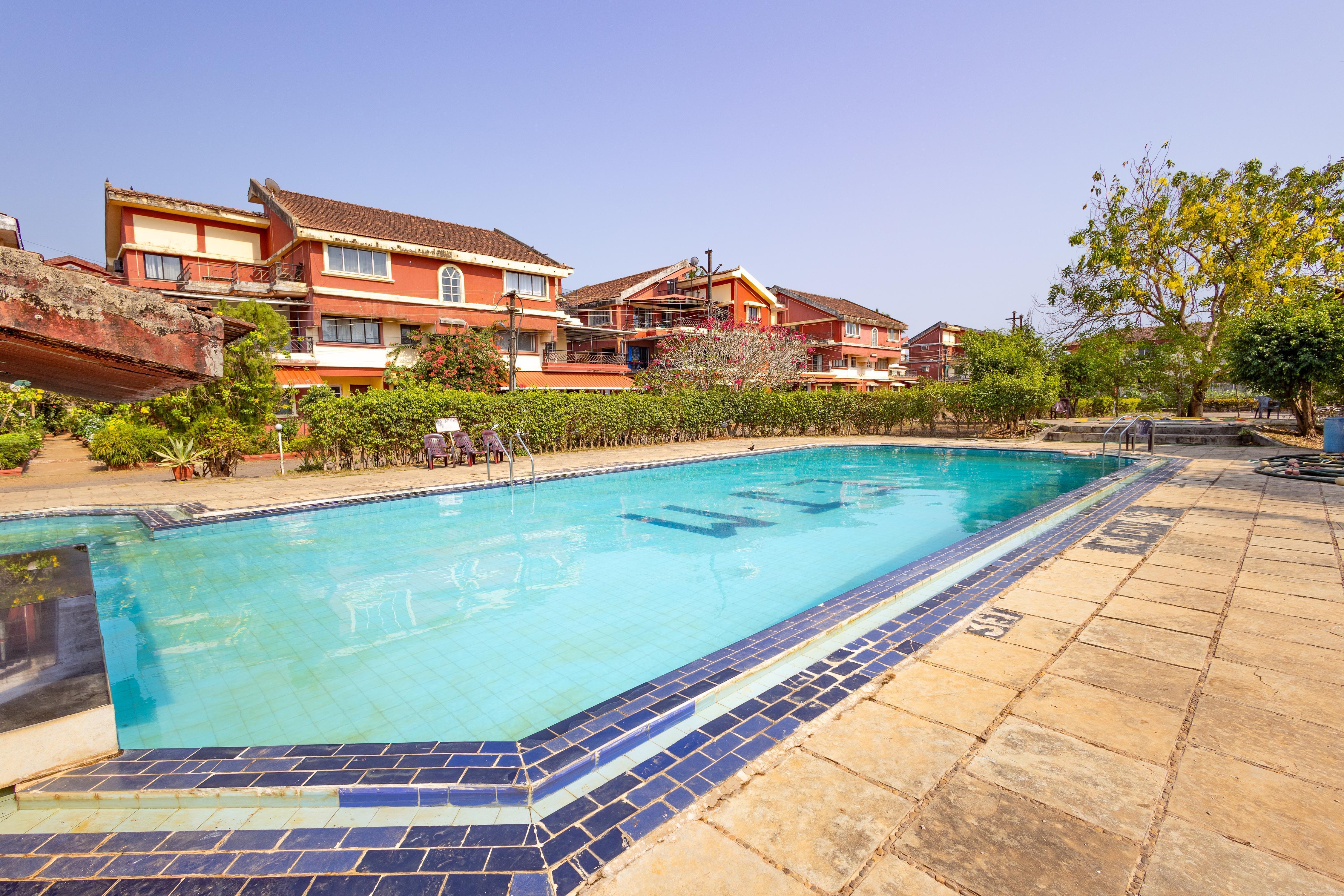 Modern 1BHK Condo, W/S. Pool, 3m. Walk To Beach - Tap to explore photos
