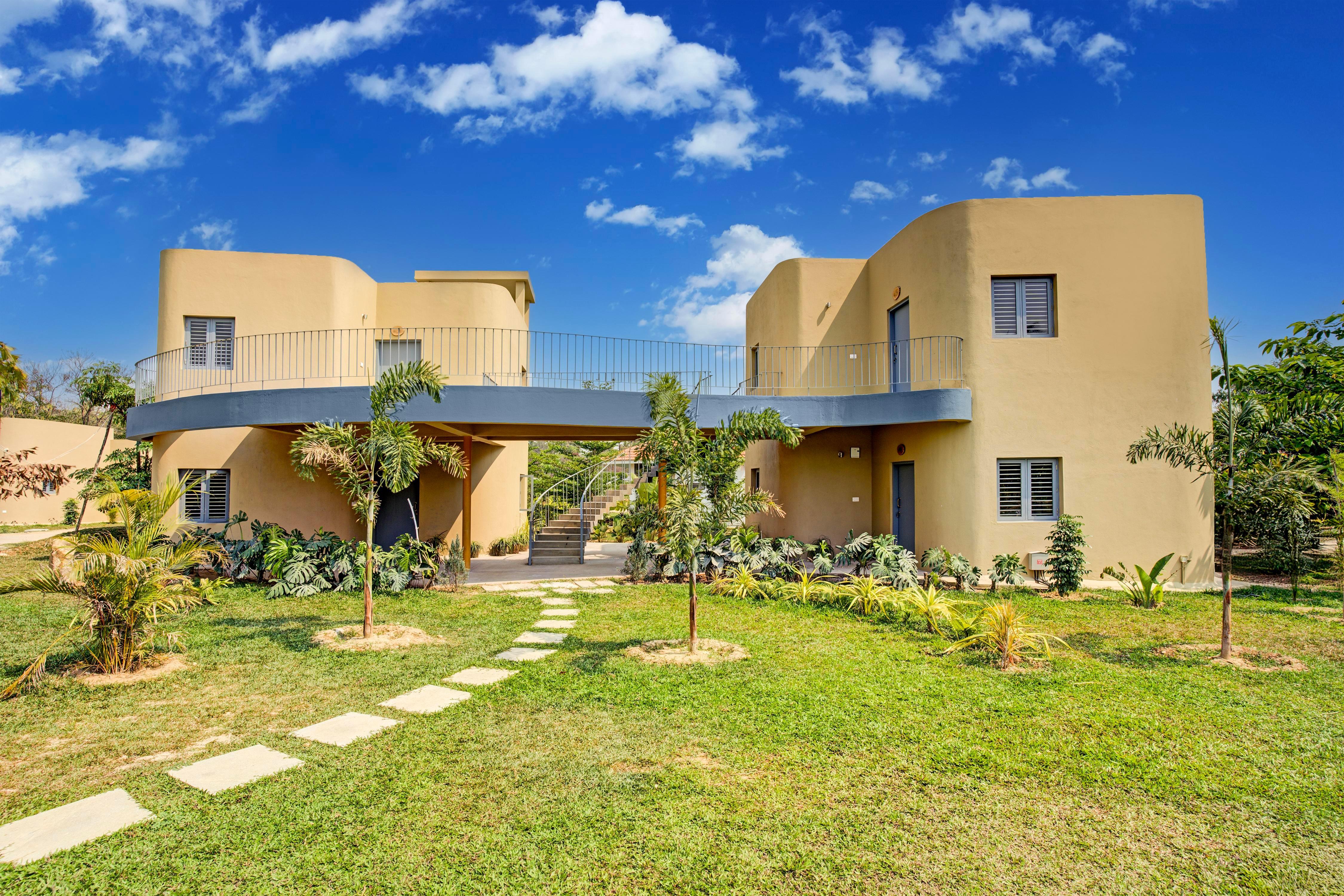 ELIVAAS Urvi Resort | Eco-Luxury Getaway with Pool, Garden & Game Zone