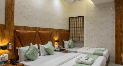 Hotel Heraa International Grant Road, Mumbai Room Type - Deluxe Triple Room Hotel Heraa International Grant Road, Mumbai Room Type - Deluxe Triple Room