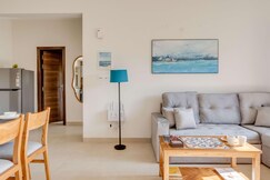 tisyastays | Blue Serenity 2BHK Apartment with Pool & Gym , Close to beach
