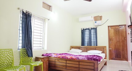 Sadhu Inn Room Type - Deluxe AC room with a balcony view