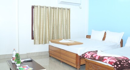 Hotel Abhiram Residency Room Type - Ultra Deluxe Triple Room