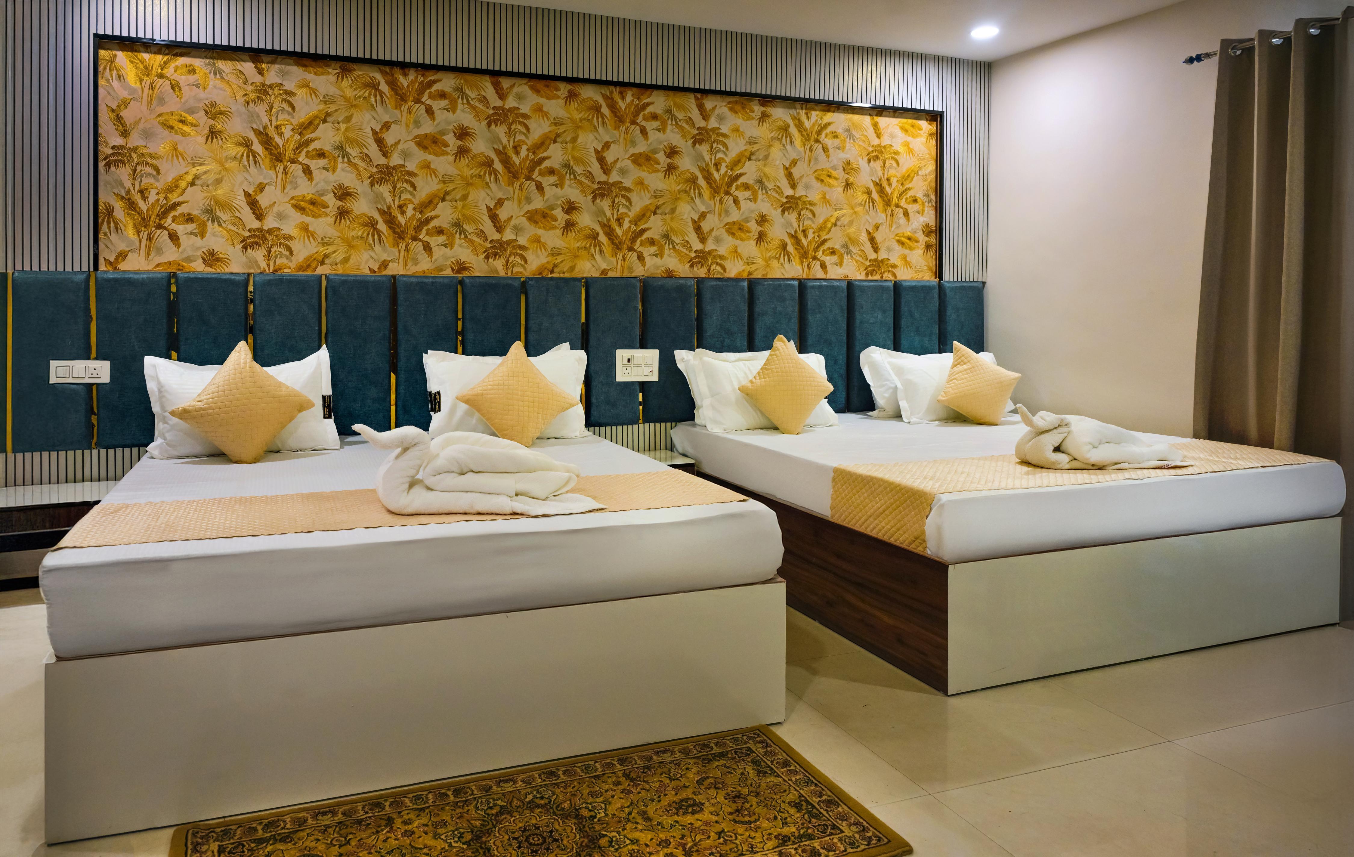 Hotel Akash Residency Room Type - Family Suite (2 double beds) Hotel Akash Residency Room Type - Family Suite (2 double beds)