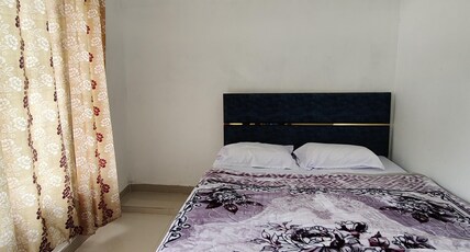 Yamdagni rishi hotel Room Type - Deluxe double bed room bridge view and hill view