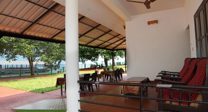 ILLIKKALAM LAKESIDE COTTAGES Kumarakom Kerala Room Type - Lake Facing Sunset View Family AC Cottage For 4 Persons ILLIKKALAM LAKESIDE COTTAGES Kumarakom Kerala Room Type - Lake Facing Sunset View Family AC Cottage For 4 Persons