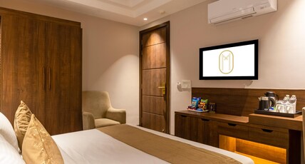 Hotel Malbork Inn@ Dilli Haat Janakpuri Room Type - Deluxe room with Smart TV Hotel Malbork Inn@ Dilli Haat Janakpuri Room Type - Deluxe room with Smart TV