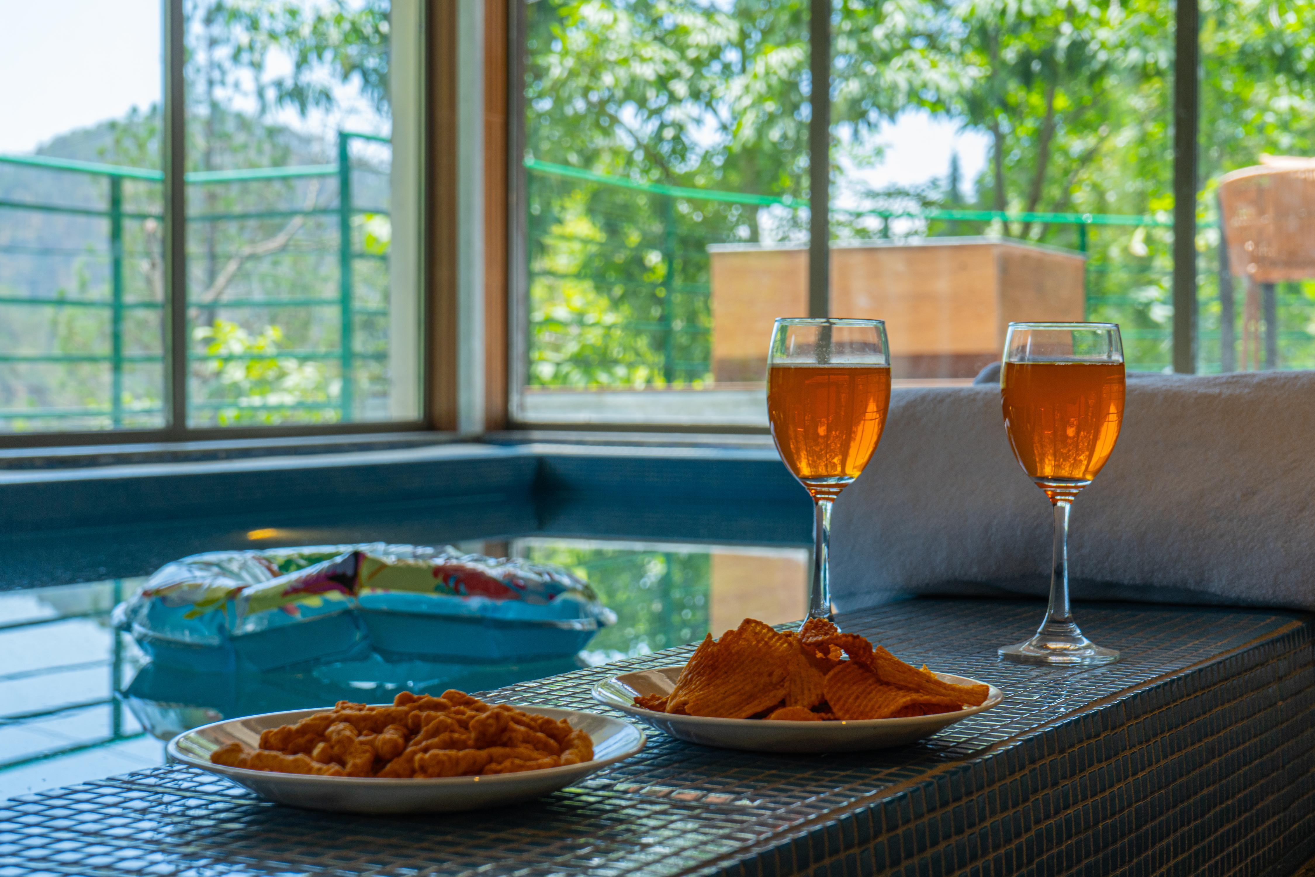 ELIVAAS Signature Blushing Pines Retreat Stunning 3-BHK Hillside Getaway with Attic & Indoor Pool - Tap to explore photos
