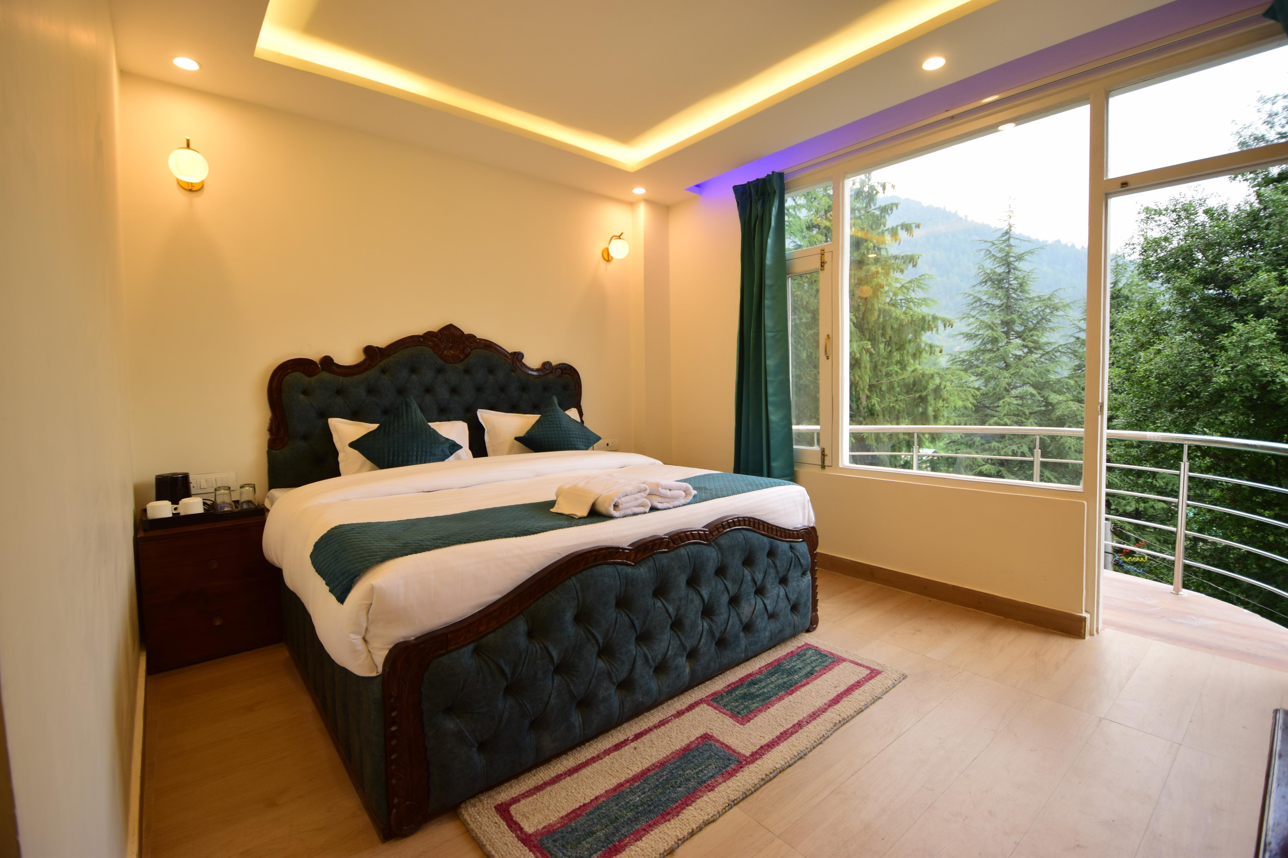 Hotel Snow World Room Type - King Bed Room with Private Balcony and Mountain View