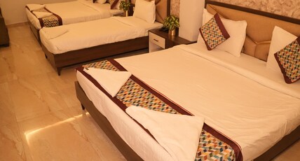 SANIDHYAM BY HOTEL SAHU NEAR KASHI VISHWANATH TEMPLE GATE Room Type - Superior Family Room