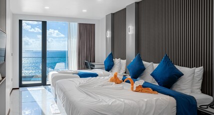 iCom Blue Sea View Room Type - Super Deluxe Triple Room with Balcony and Sea View iCom Blue Sea View Room Type - Super Deluxe Triple Room with Balcony and Sea View