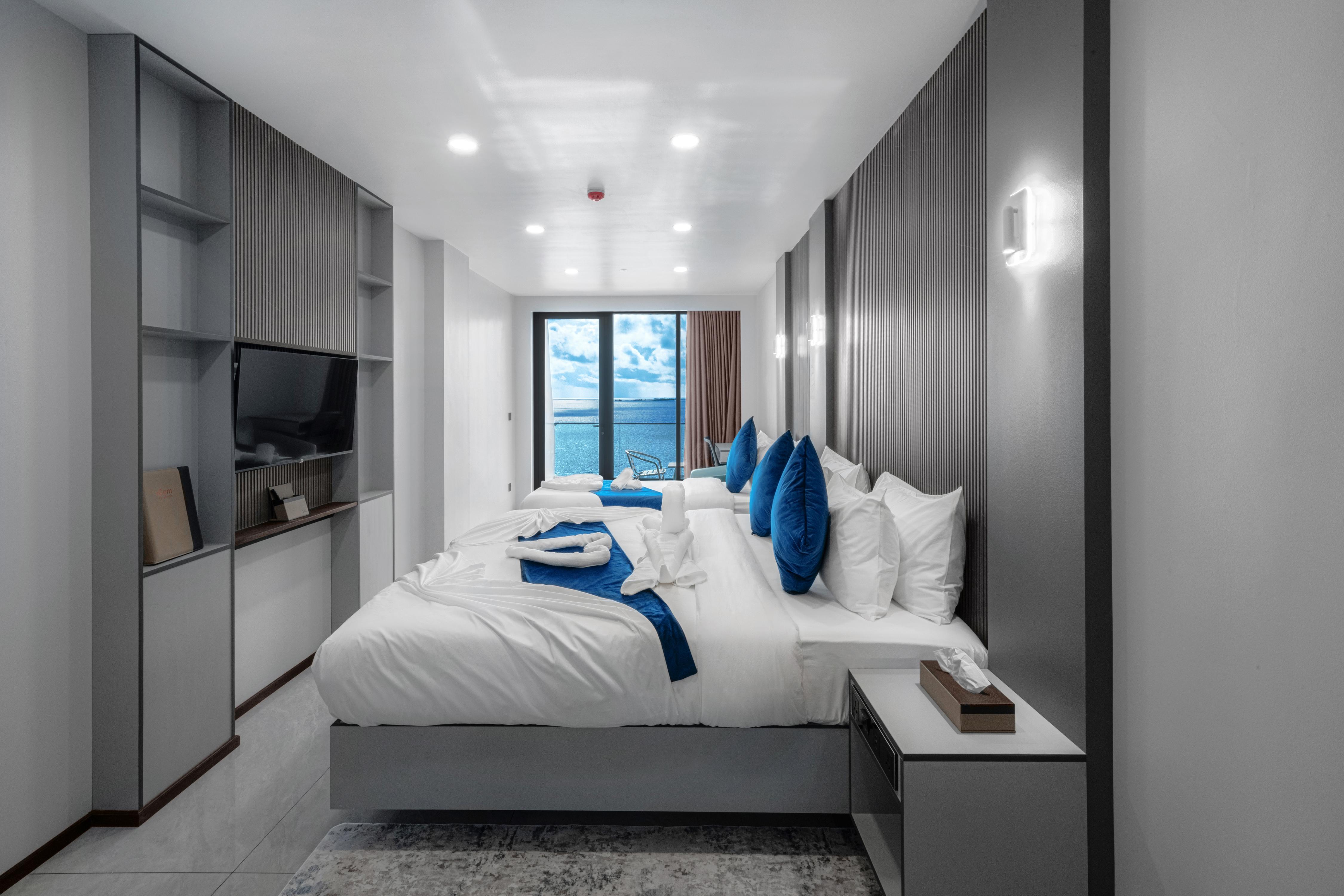 iCom Blue Sea View Room Type - Premium Deluxe Family Room with Balcony and Sea view iCom Blue Sea View Room Type - Premium Deluxe Family Room with Balcony and Sea view