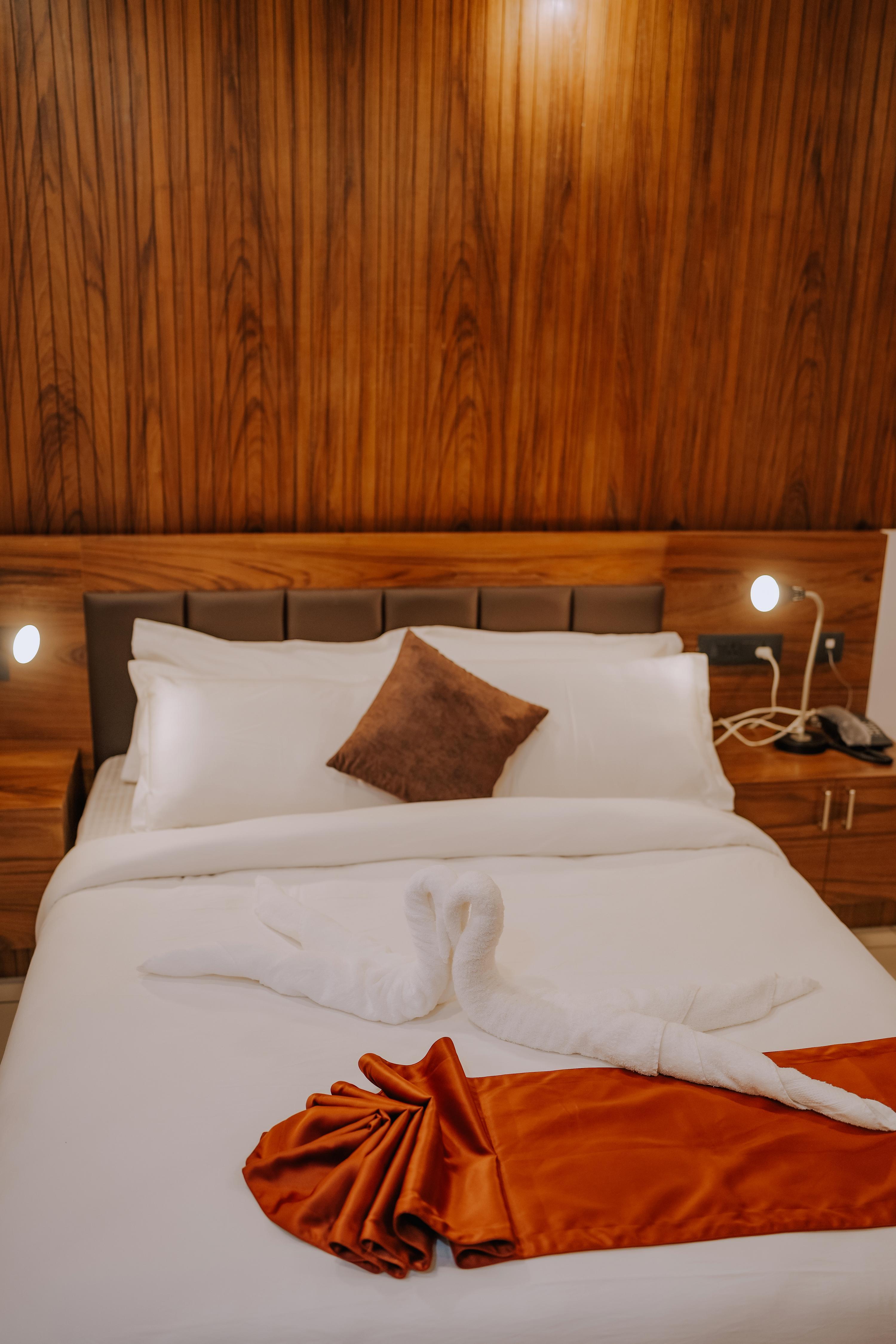 Refresh Inn and Suites  - Tap to explore photos
