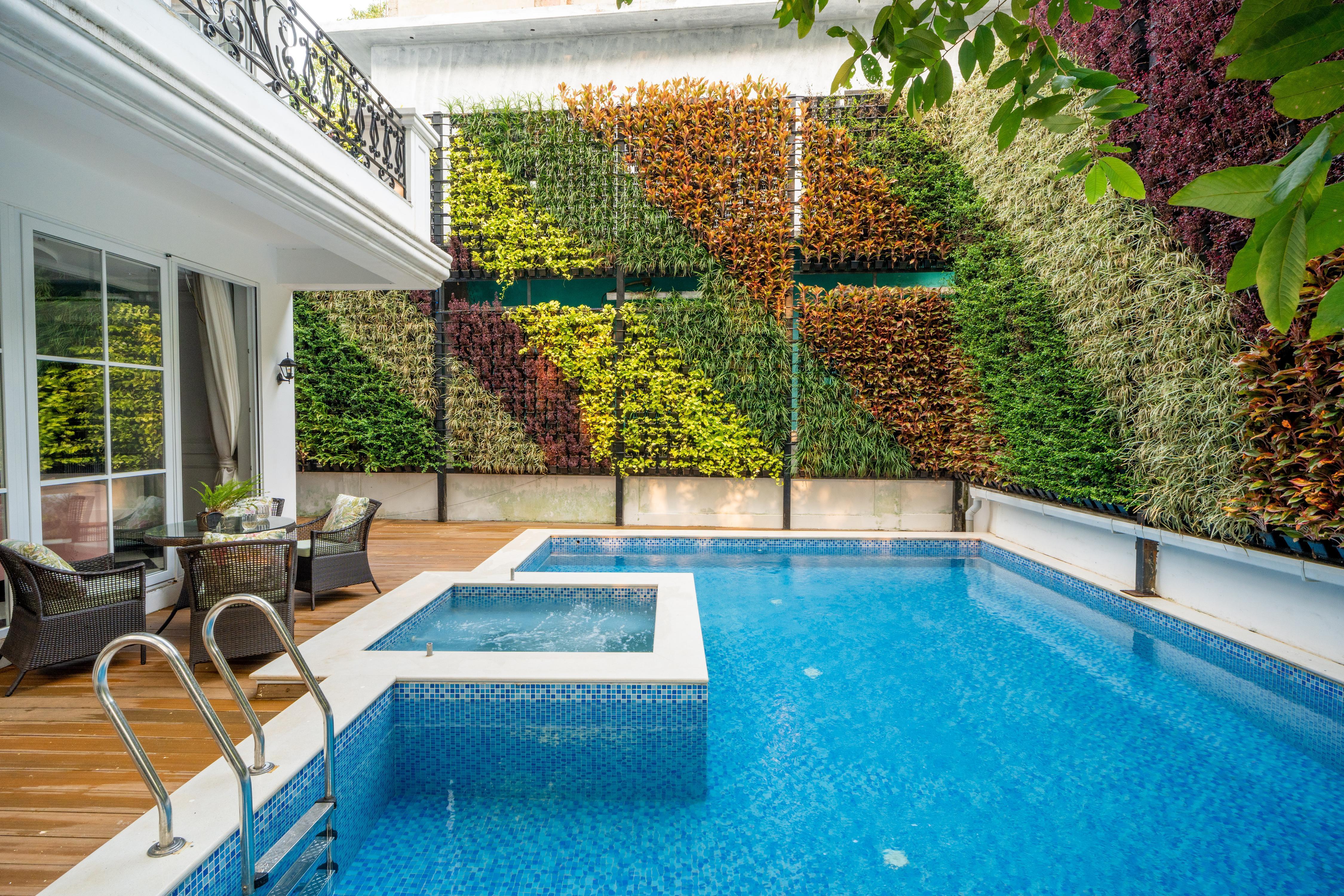 ELIVAAS Prive Suntuarios Casa Ikkebana | 4 BHK With Jacuzzi, Pvt Pool & Bar - Tap to explore photos