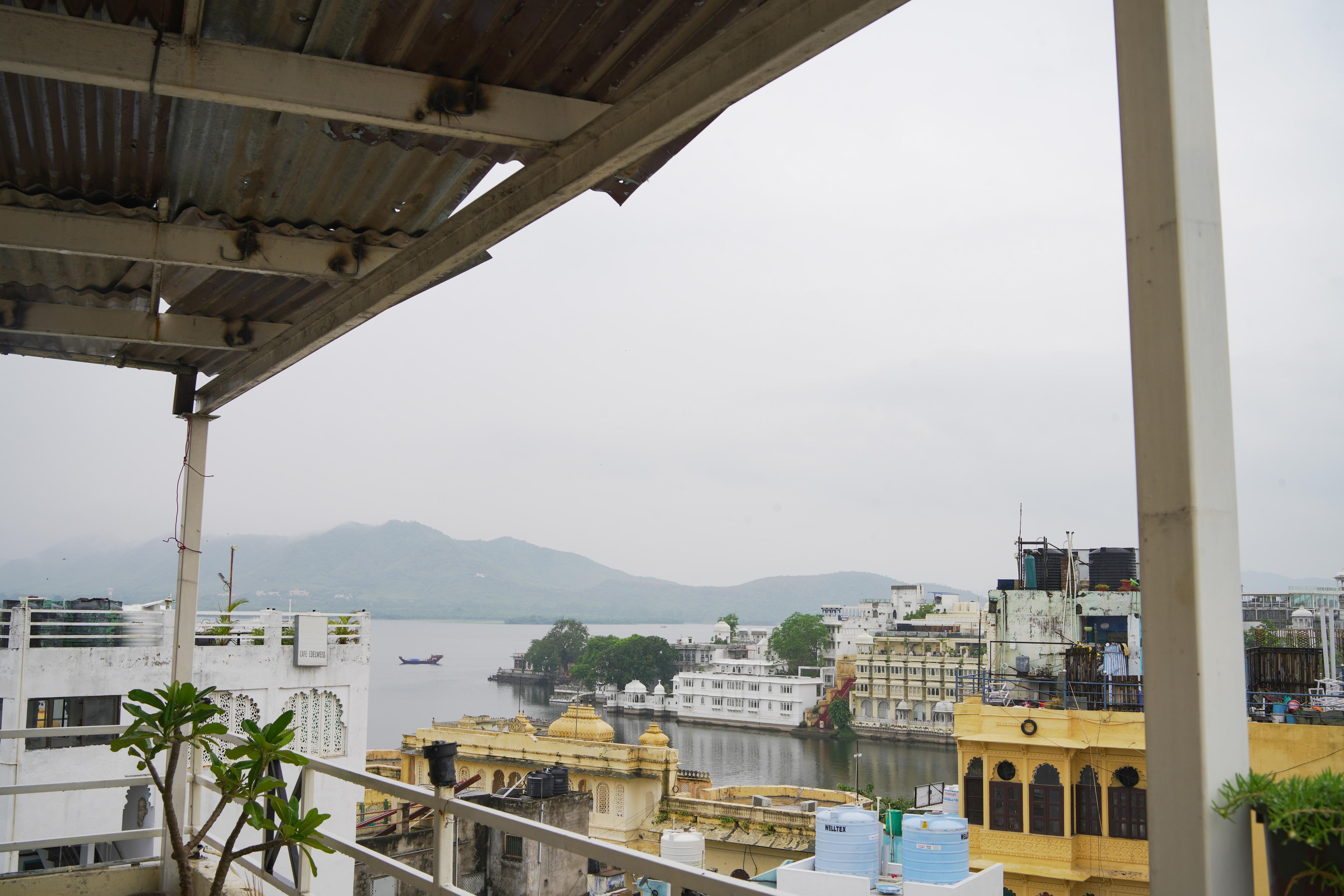 Old Skool Hostel Udaipur |Rooftop Restaurant at Lake Pichola - Tap to explore photos