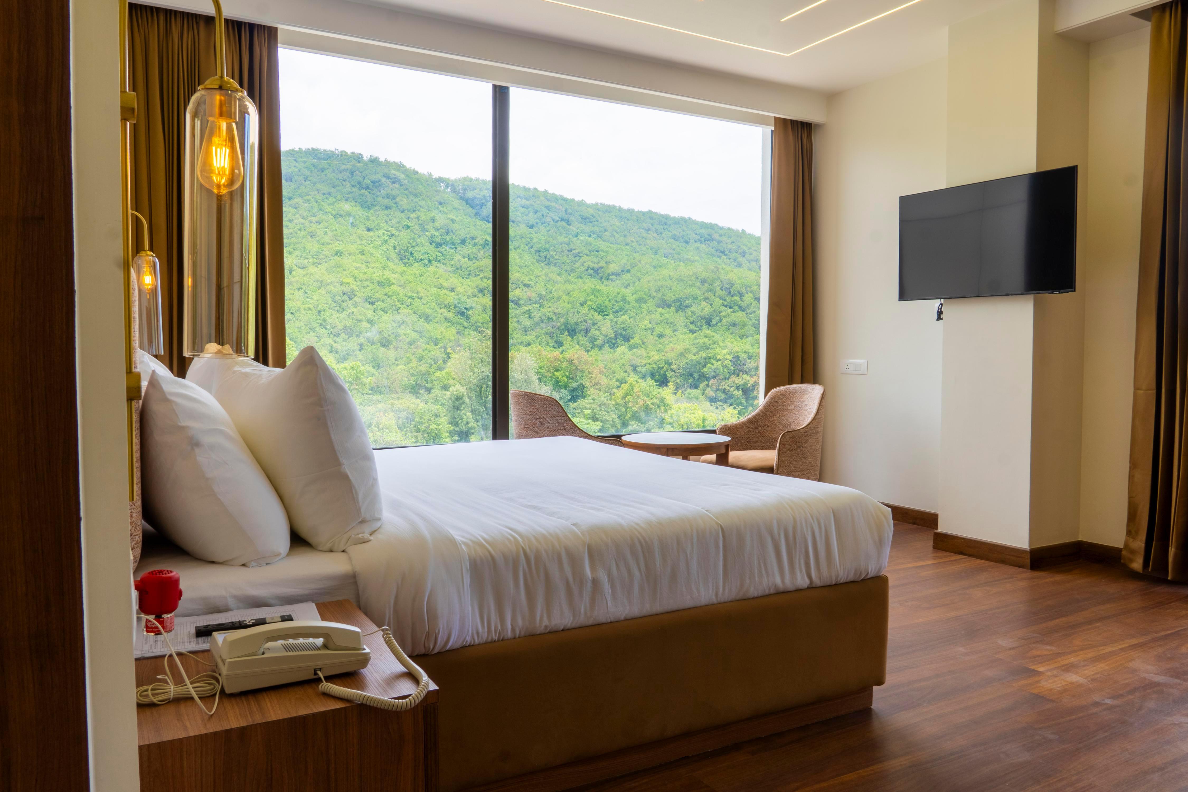 Hotel Malsi Mist - Tap to explore photos