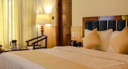THE DOGRI HOMES Room Type - Super Deluxe Room