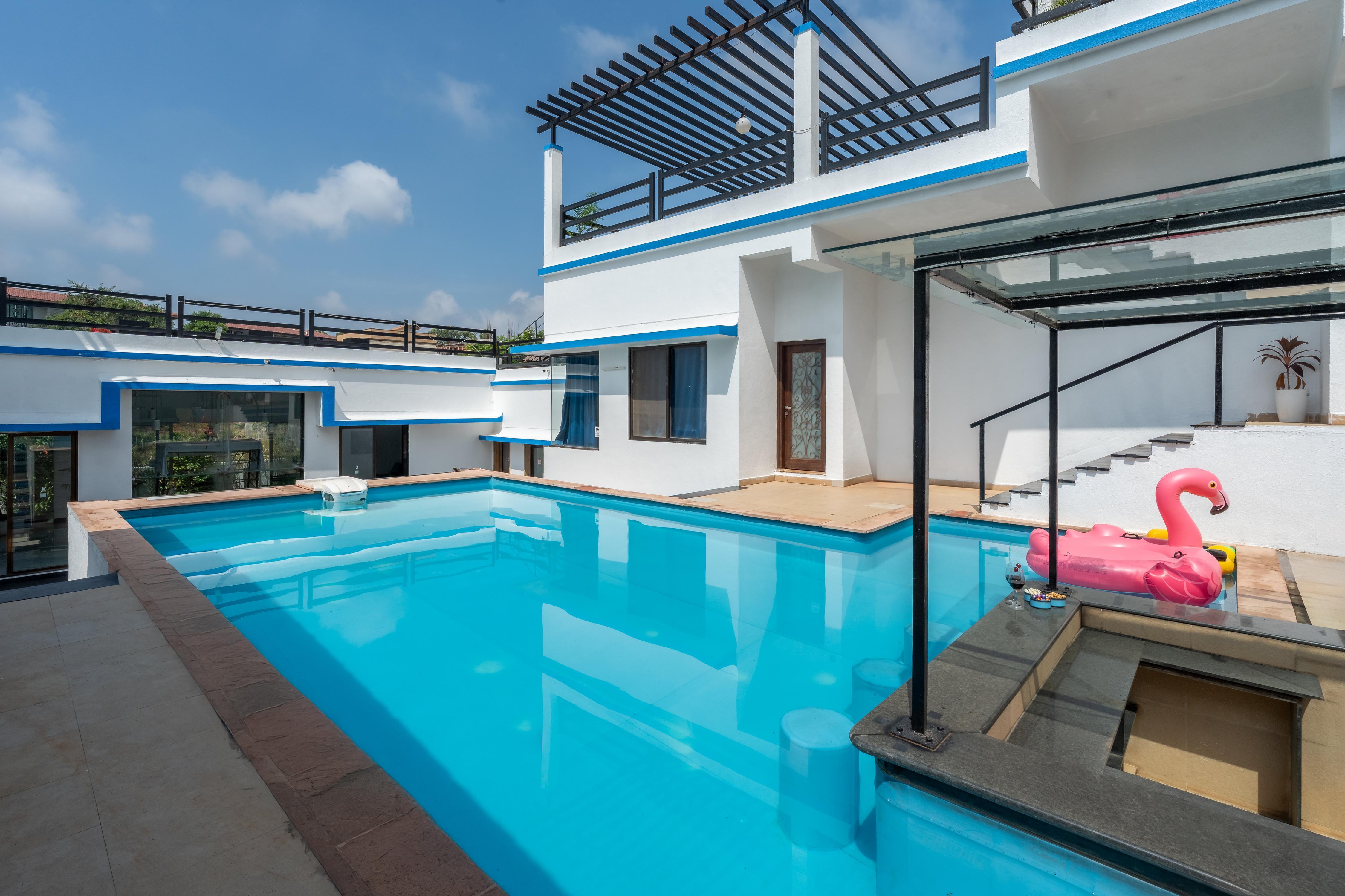 Stayzation Alpha Z villa 5bhk turf paddle villa - Tap to explore photos