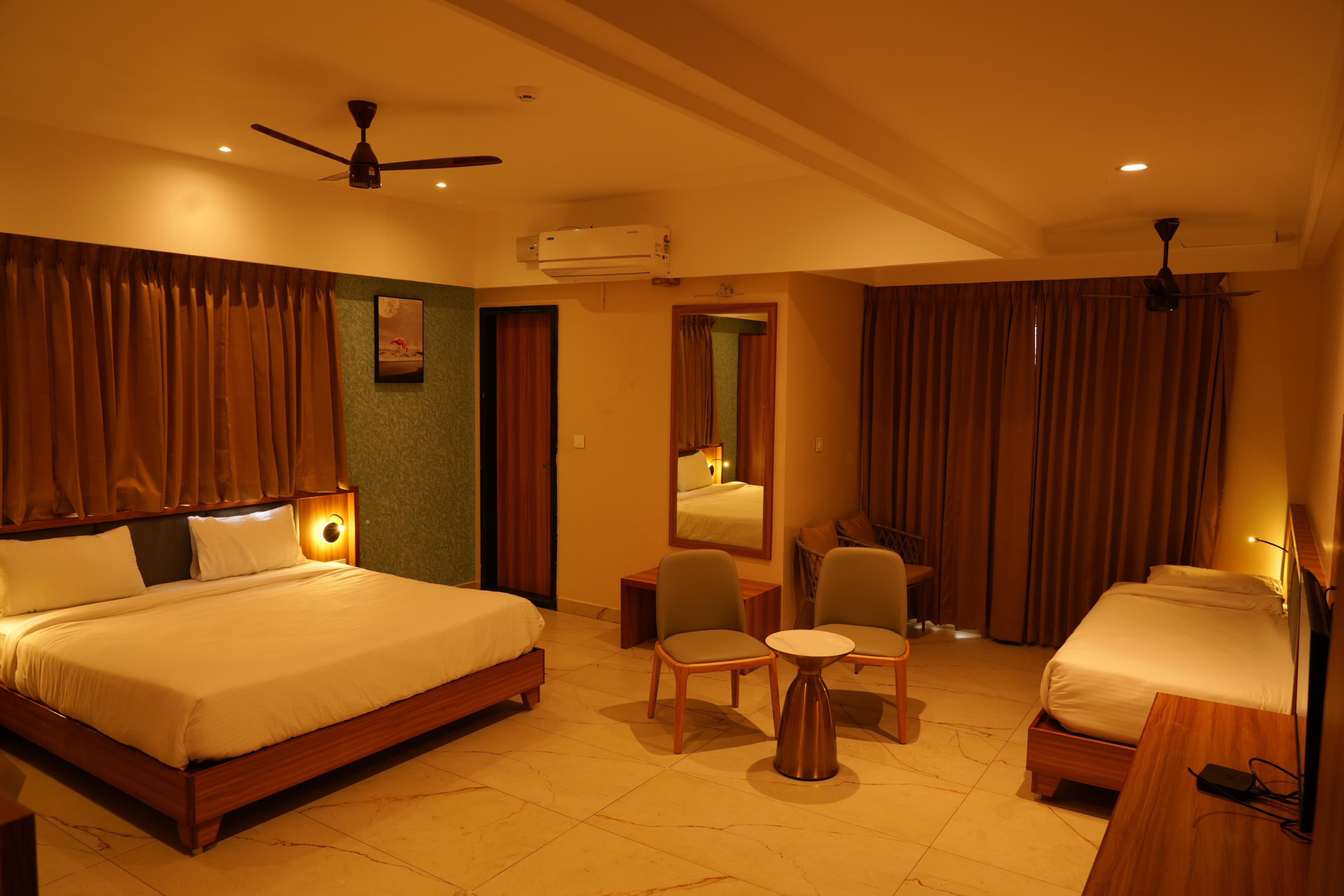 hotel river view sringeri Room Type - deluxe with triple sharing
